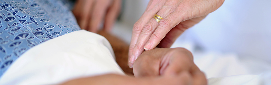 Hospital care givers taking care of patient
